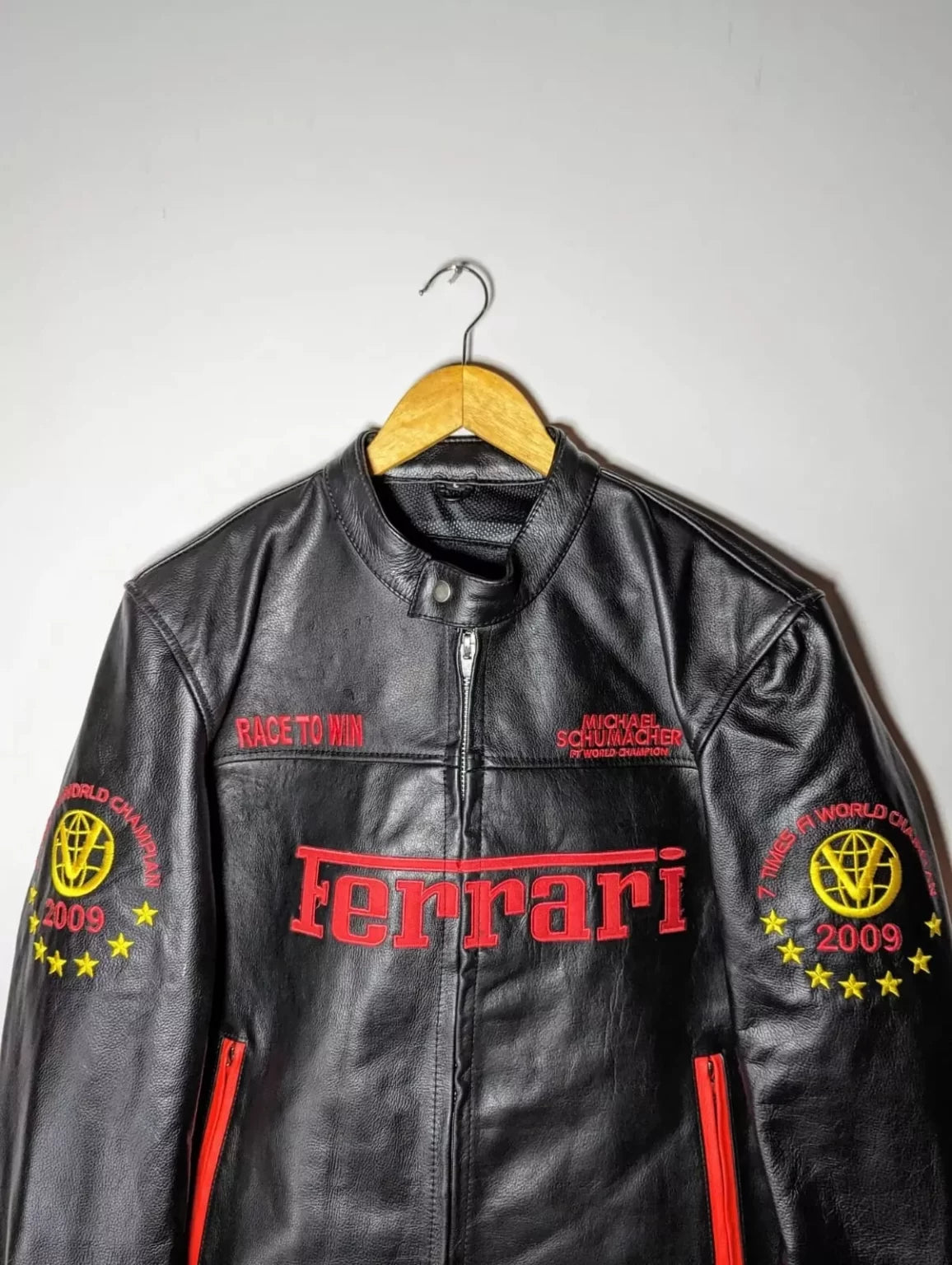 Near Front view of Ferrari Michael Schumacher racing jacket in genuine leather with embroidered Ferrari logos