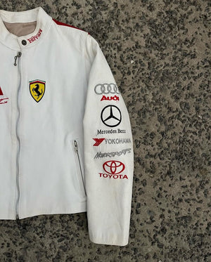 White jacket with various car brand logos on a textured surface
