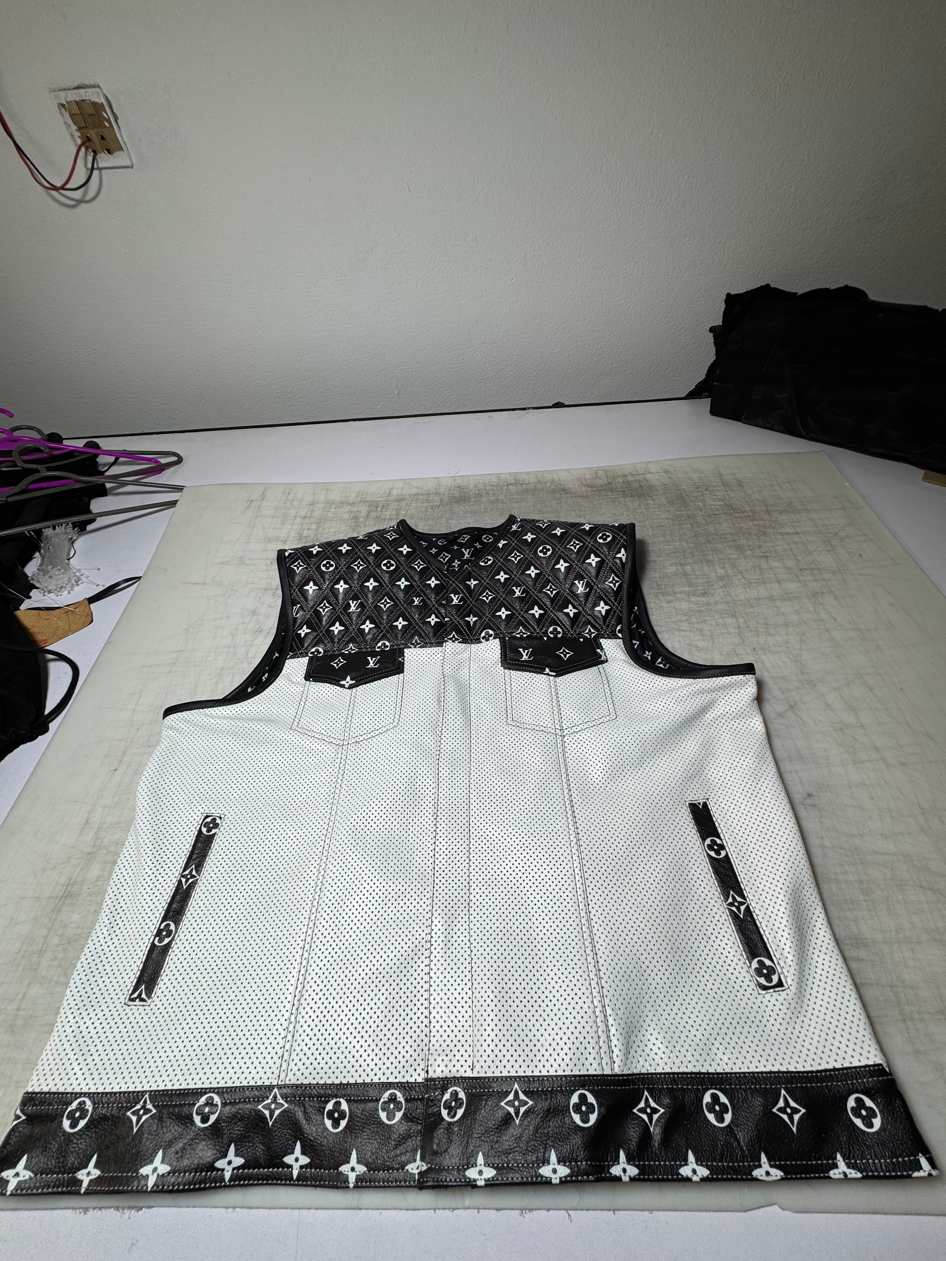LO*UIS VUIT**N WHITE LEATHER DIAMOND STITCHING WITH BLACK PERFORATED LEATHER - LEATHER CHAPTER