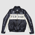 Front view of a black and off-white leather Ferrari Formula 1 World Championship jacket with "FERRARI" text on the chest.
